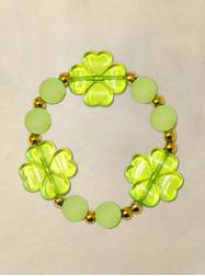 8" Elastic Bracelet with 3 Green Clover, Frosted Green Beads and Gold Spacers
