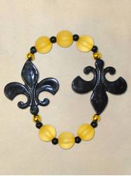 8" Elastic Bracelet with Black Fleur De Lis and Gold Spacers